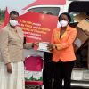 The First lady Janet Museveni and an official from FINCA Uganda