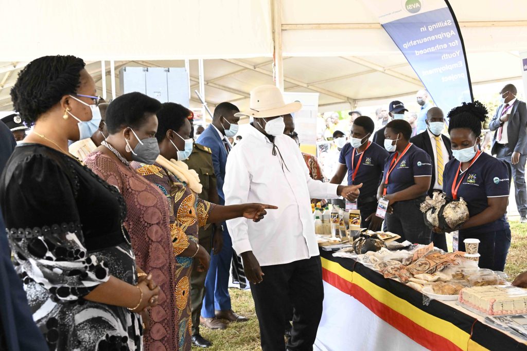 President Yoweri Museveni touring the stalls where the youth display the works and skills